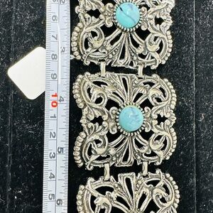 Turquoise and silver bands on this bracelet